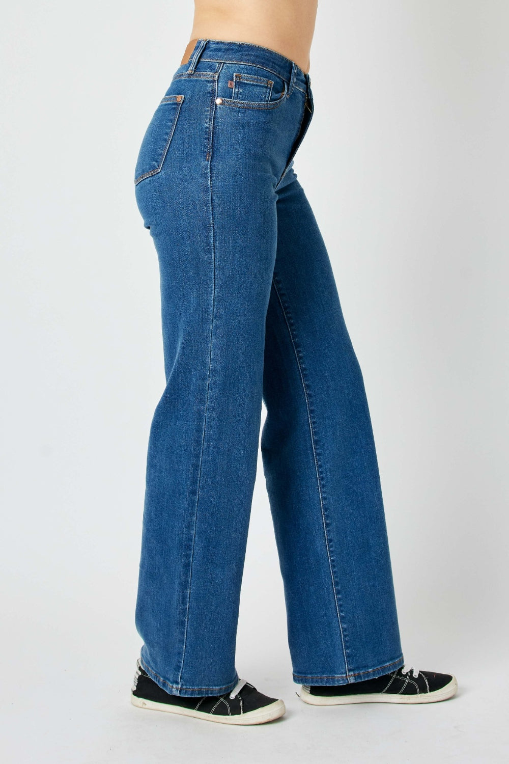 Judy Blue high-rise straight leg jeans in a medium wash with moderate stretch.