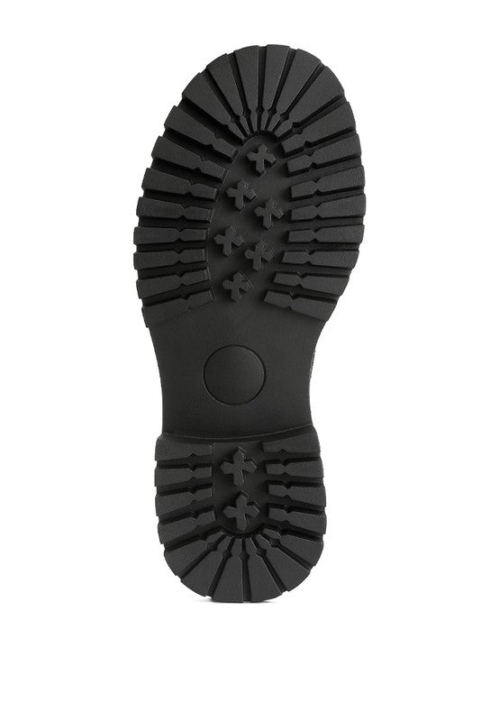 Bottom sole view of black Honora Suede Chunky Loafers with textured TPR sole