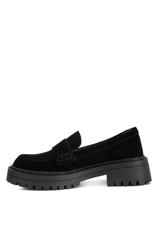 Side view of black Honora Suede Chunky Loafers with platform detail