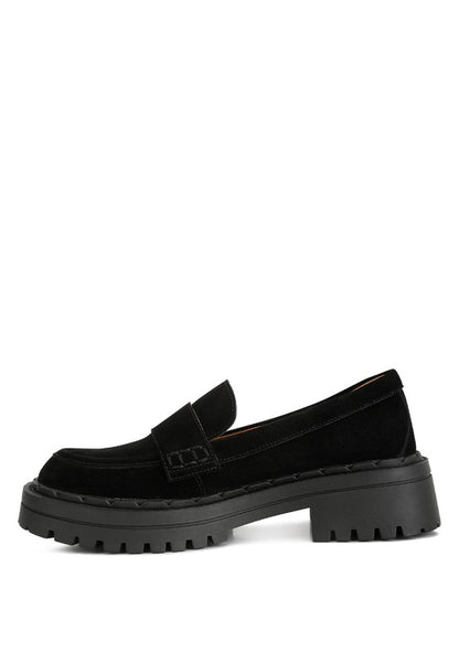 Side view of black Honora Suede Chunky Loafers with platform detail