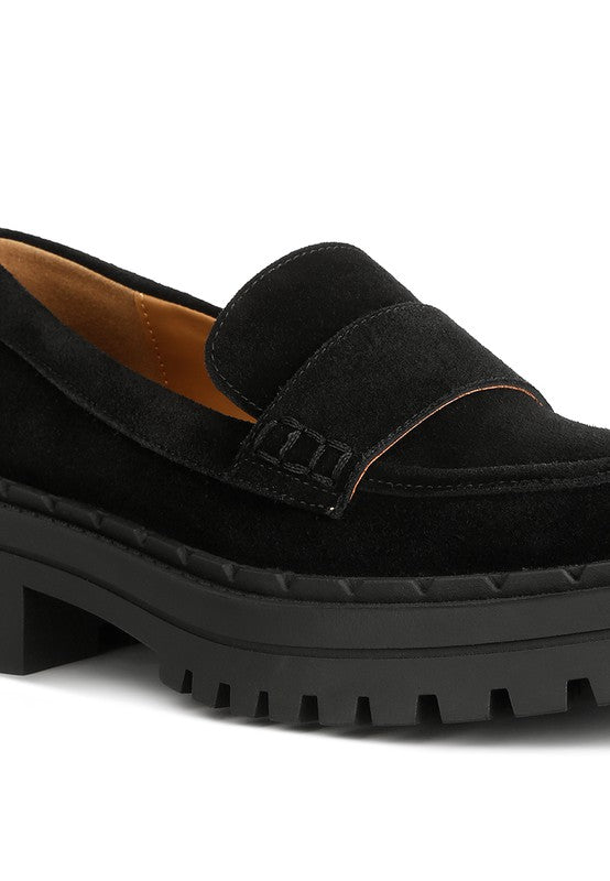 Close up of black Honora Suede Chunky Loafers suede texture and lug sole