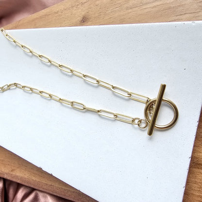 Nissa Gold Paperclip Chain Necklace on white background, 16-inch, 18K gold-plated stainless steel with PVD coating.