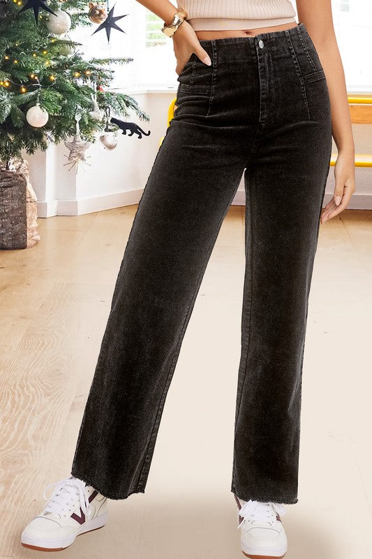 Black mineral-washed corduroy wide-leg ankle-length jeans with raw-edge hem, front dart detail, zip fly, and back pockets.