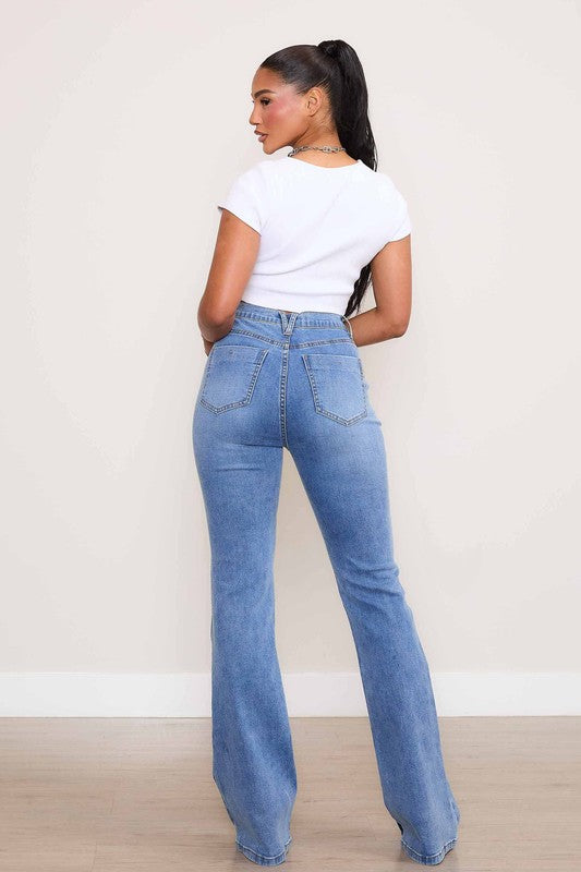 Vibrant M.i.U Kayla Square Pocket Bootcut Jeans in medium stone wash, featuring a high rise, zip fly, and large square front pockets for a modern touch.