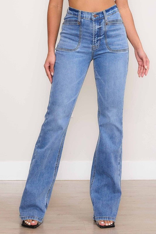 Vibrant M.i.U Kayla Square Pocket Bootcut Jeans in medium stone wash, featuring a high rise, zip fly, and large square front pockets for a modern touch.