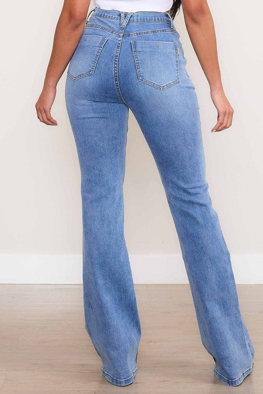 Vibrant M.i.U Kayla Square Pocket Bootcut Jeans in medium stone wash, featuring a high rise, zip fly, and large square front pockets for a modern touch.