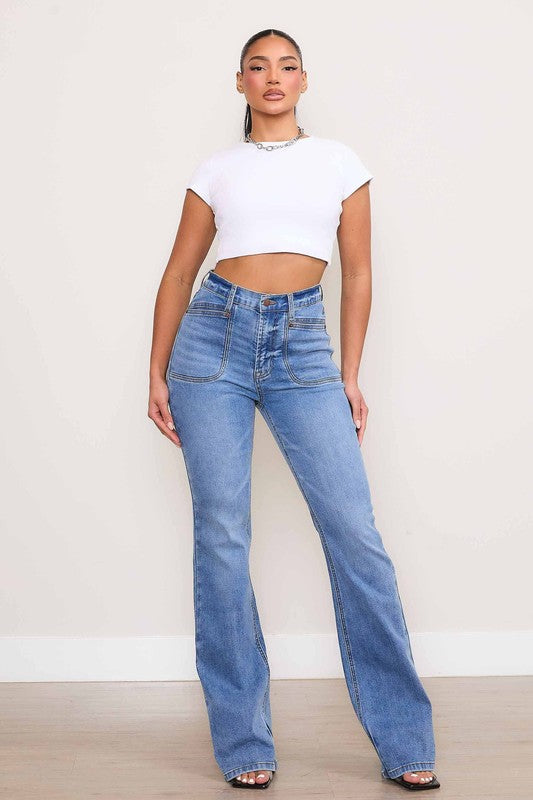 Vibrant M.i.U Kayla Square Pocket Bootcut Jeans in medium stone wash, featuring a high rise, zip fly, and large square front pockets for a modern touch.