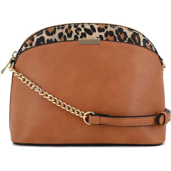Tan Leopard Accent Crossbody Bag with leopard edge, gold chain strap, zip top, and exterior slip pockets.