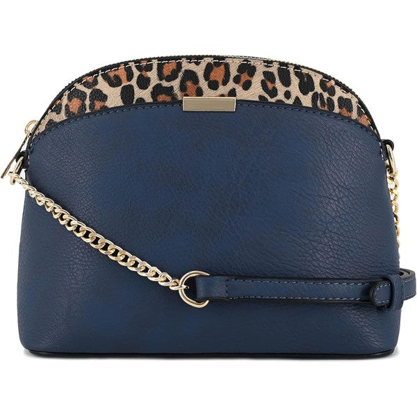 Navy Leopard Accent Crossbody Bag, small dome with leopard trim, chain strap, secure zip, and streamlined pockets.
