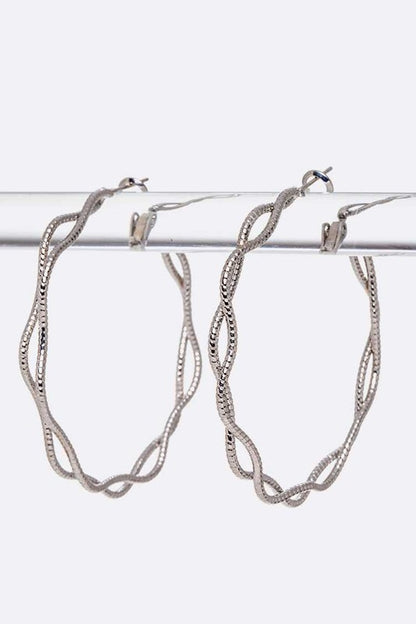 Rhodium Woven Iconic Hoop Earrings with sleek silver finish and woven detailing.