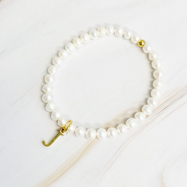 Freshwater Pearl Initial Charm Bracelet featuring genuine freshwater pearls and a gold-plated letter J initial charm, approximately 6.5" before stretch.