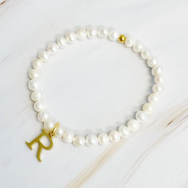 Freshwater Pearl Initial Charm Bracelet featuring genuine freshwater pearls and a gold-plated letter R initial charm, approximately 6.5" before stretch.