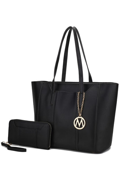 Black Nikkita tote bag with gold-tone hardware, zip top, and spacious interior for work or everyday use.
