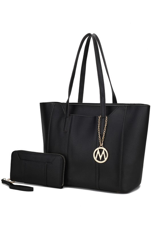 Black Nikkita tote bag with gold-tone hardware, zip top, and spacious interior for work or everyday use.