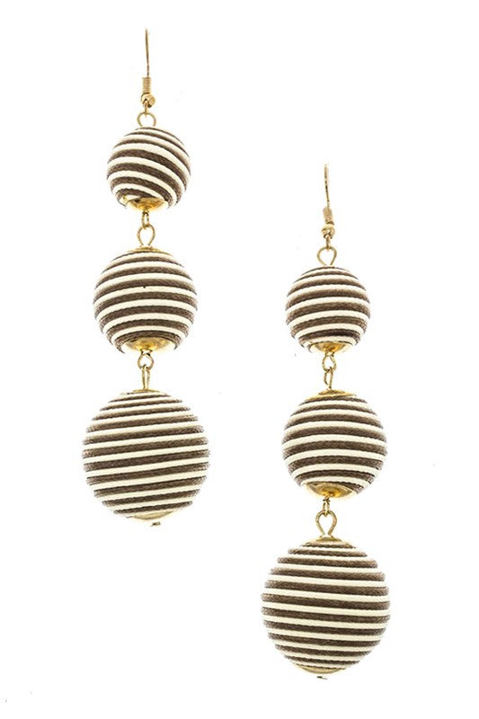 Brown ball drop earrings with a 4-inch drop.