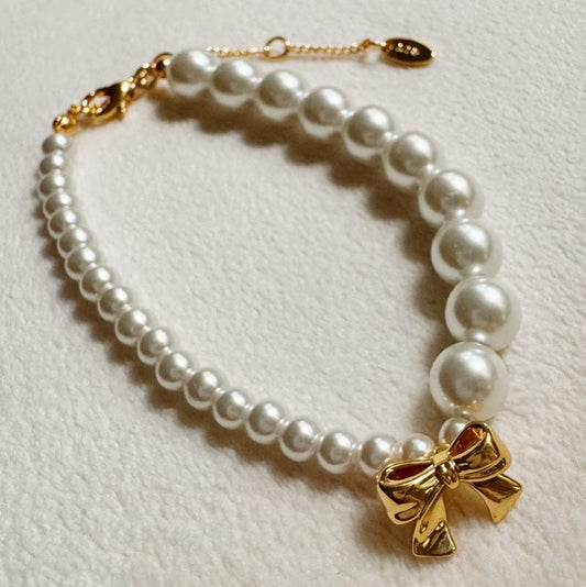 Jeanne Dangle Bow Pearl Bracelet