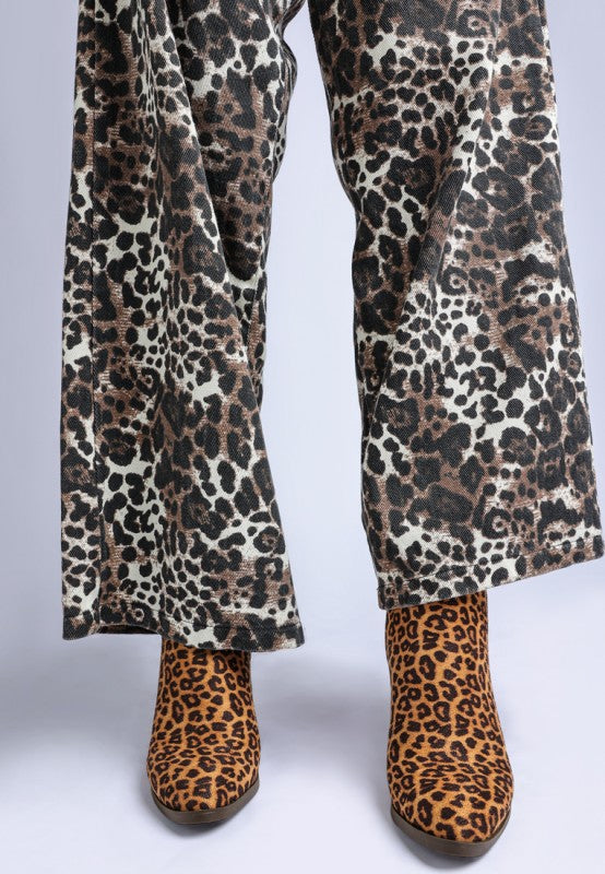 Front view of Lunara Leopard Print Boots with closed almond toe design