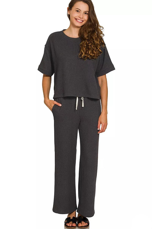 Meg Raised Rib Set Black front view – ribbed short sleeve tee with drawstring pants.