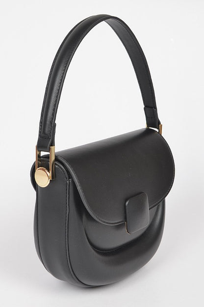 Side angle view of Quinn Convertible Shoulder Bag in black vegan leather with gold hardware.