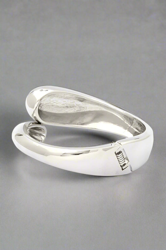 Polished Organic Hinged Bangle in silver, back view highlighting spring-hinged closure.