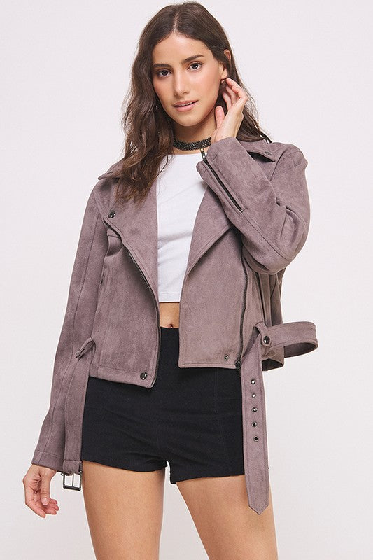 Grey belted long sleeve zippered suede moto jacket with front zippers, snap details, and two zipper pockets.