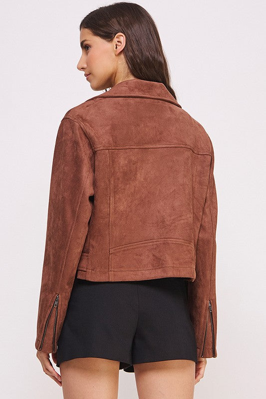 Chocolate belted long sleeve zippered suede moto jacket with front zippers, snap details, and two zipper pockets.