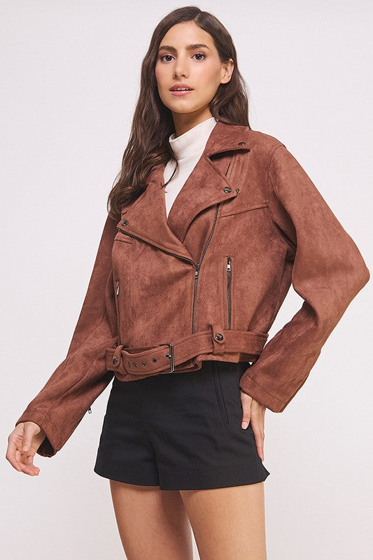 Chocolate belted long sleeve zippered suede moto jacket with front zippers, snap details, and two zipper pockets.