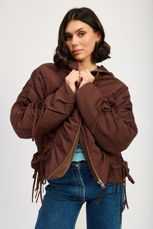 Candes Ruched Puff Jacket in brown front view with hood