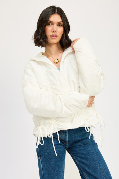 Ivory Candes Ruched Puff Jacket front view with zip closure