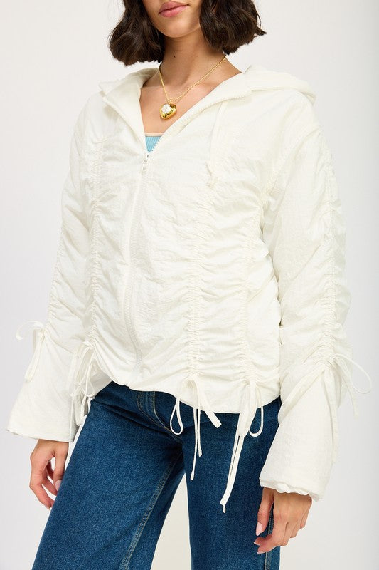 Close-up front view of ivory Candes Ruched Puff Jacket with ruching