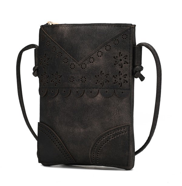 Black Amentia Crossbody Bag featuring laser-cut scallop details and adjustable strap.