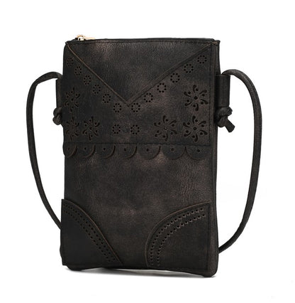 Black Amentia Crossbody Bag featuring laser-cut scallop details and adjustable strap.