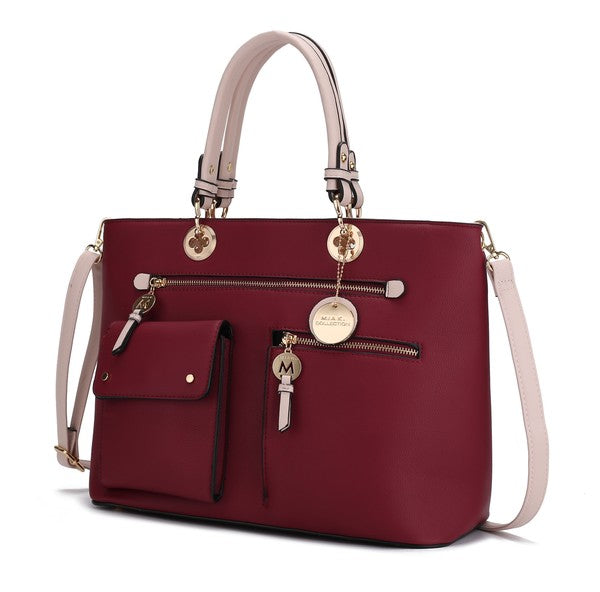 A detailed product shot showcasing the Wine-Blush color-block combination, top handle design, and structured silhouette.