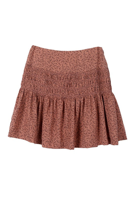 Brown floral smocked skirt with pleats, side zipper, and lining for coverage.