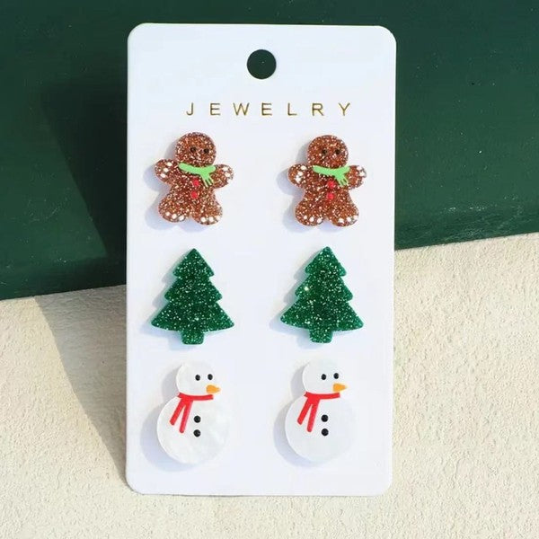 Festive 3 pack featuring a gingerbread man, snowman, and classic Christmas tree design. Perfect for adding a playful touch to your holiday outfit.