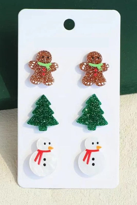 Festive 3 pack featuring a gingerbread man, snowman, and classic Christmas tree design. Perfect for adding a playful touch to your holiday outfit.