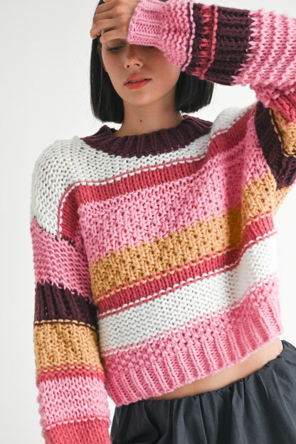 Close up of Kai Mock Neck Striped Sweater showing chunky knit and bold stripes