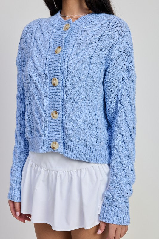 Close up of Caroline Cardigan showing chunky cable knit and oversized buttons