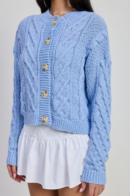 Close up of Caroline Cardigan showing chunky cable knit and oversized buttons