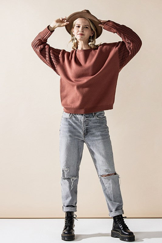 Model in marsala Jodie sweater with jeans, casual chic