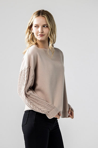Taupe Jodie sweater with textured sleeves shown from side