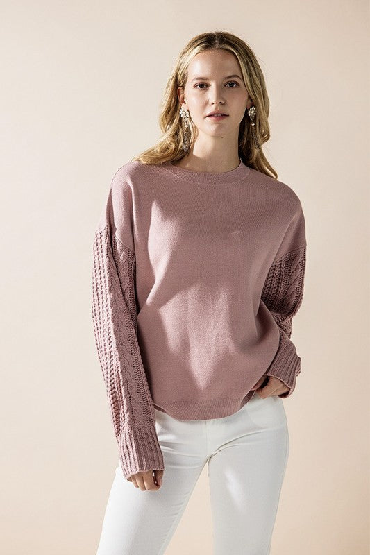 Jodie Sweater in mauve pink with textured cable knit sleeves