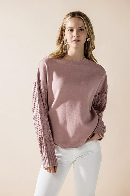 Jodie Sweater in mauve pink with textured cable knit sleeves