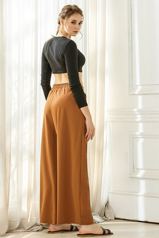 Ember Plus Size Crepe Wide Leg Pants in cinnamon back view elastic waistband