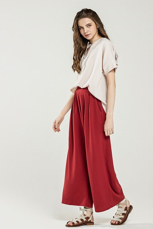 Ember Plus Size Crepe Wide Leg Pants in cognac side view flowy wide leg