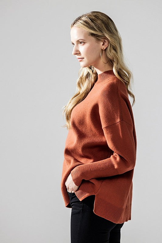 Rust Danika Mock Neck Sweater side view showing dropped shoulder fit
