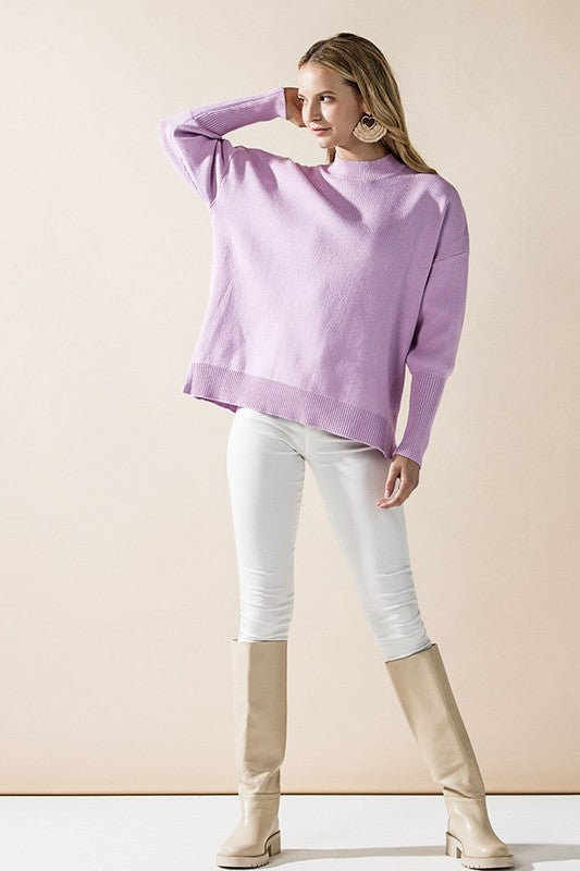 Lavender Danika Mock Neck Sweater full body styled with white pants

