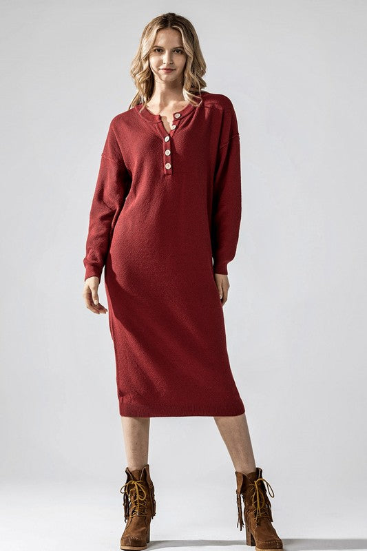 Sweater Dress in brick red knit with coconut button detail.