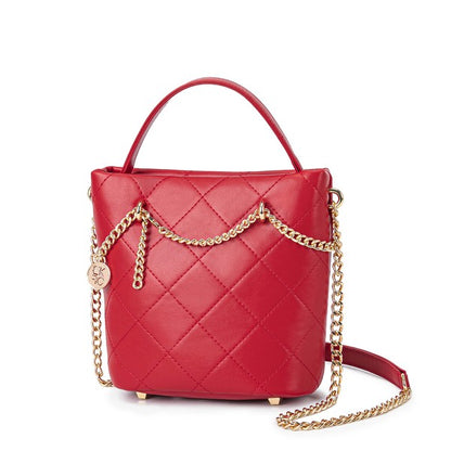 Red MKF Damaris Crossbody Bag, quilted design, gold-tone hardware, convertible strap option.