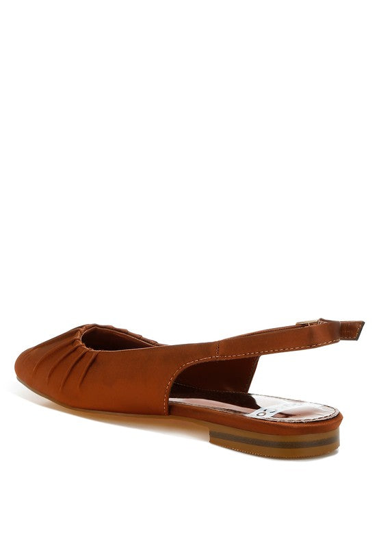 Brown satin slingback shoes with square toe, adjustable buckle strap, flat heel, and plush cushion insole.